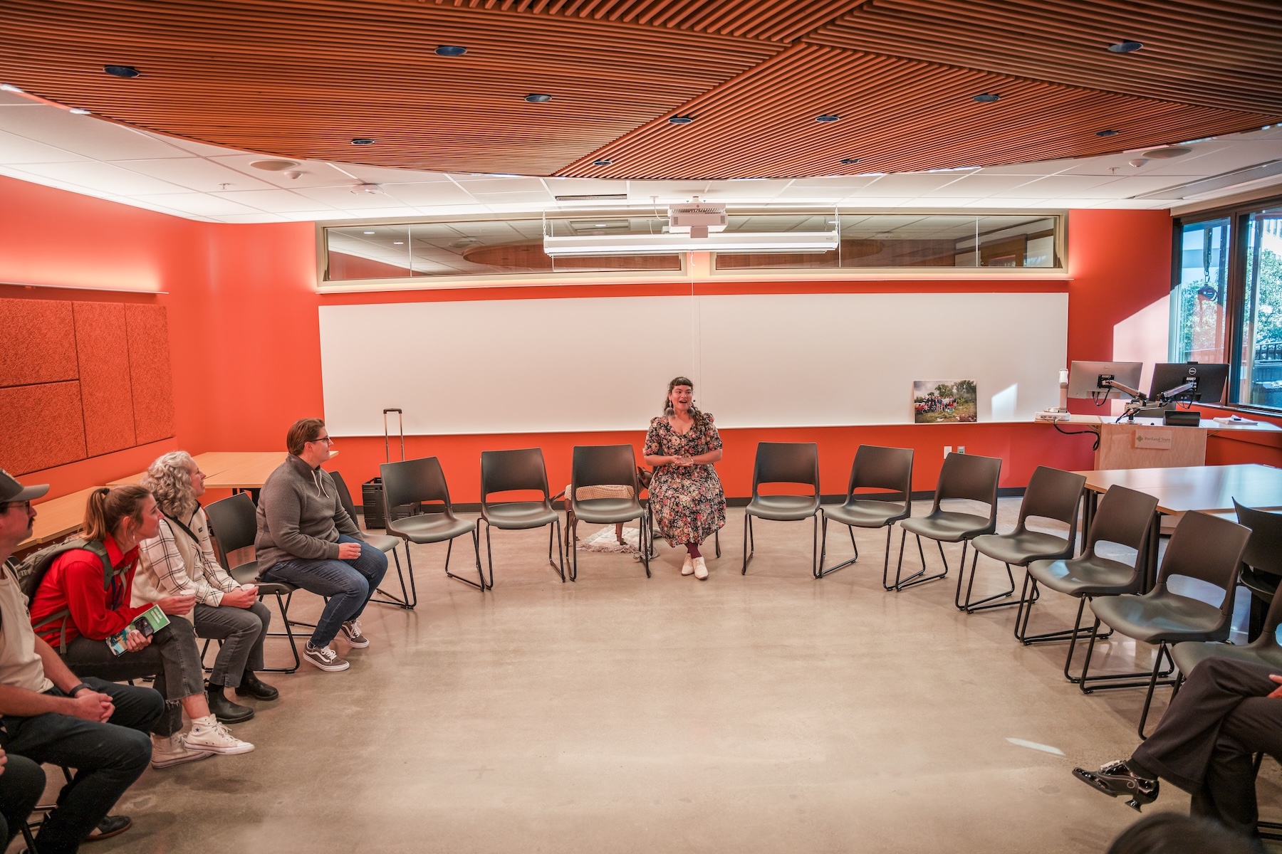 People seated in round in community classroom in Vernier Science Center